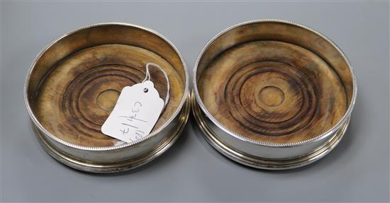 A pair of modern silver wine coasters, A Chick & Sons, London, 1971, 12.7cm dia.